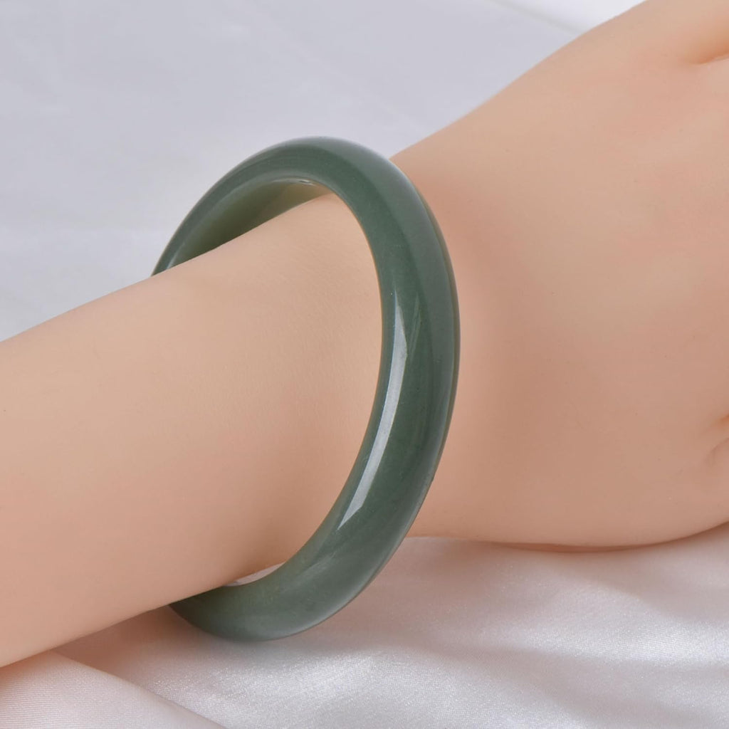 Green natural jade bracelet, known for its healing, protective, and wealth-attracting properties; natural gemstone feng shui jewelry