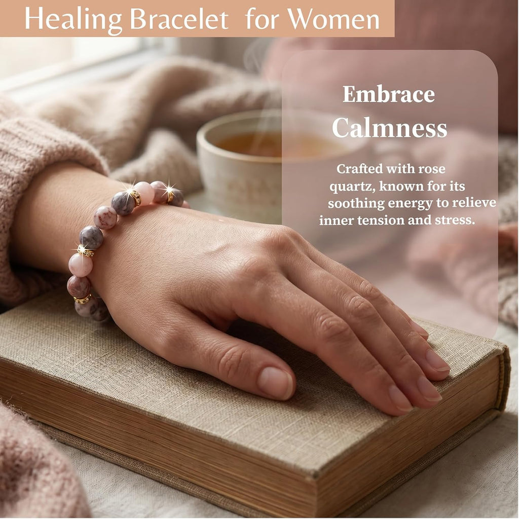 Healing Bead Bracelet—A rose quartz and chakra crystal bracelet that helps relieve anxiety and reduce stress; this soothing, stretchy bracelet calms both body and mind, making it perfect for yoga, meditation, and everyday wear